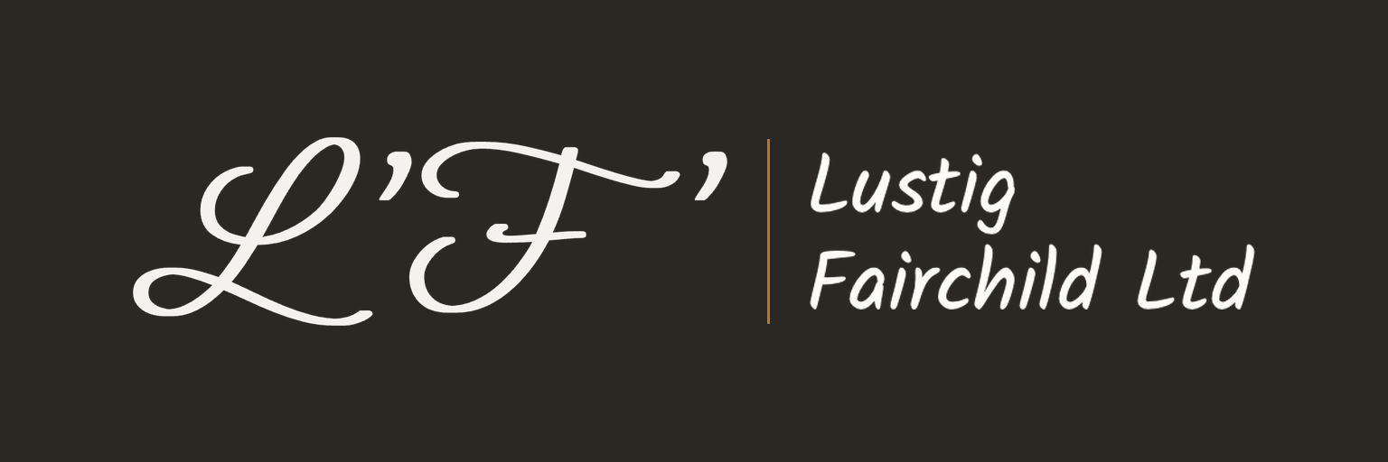 The Lustig Fairchild banner: the script monogram, an amber rule, and the company name on a dark field.